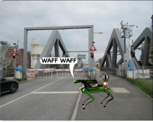 Der grüne Roboterhund Spot steht an der Rethebrücke und verbellt ein Auto: Waff Waff