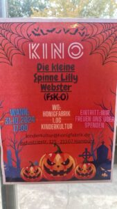 Ein rotes Plakat, Spinnweben, VA-Infos