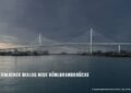 Eine Brücke mit zwei Pylonen und Schrägseilen vor einem dunklen Hintergrund.
